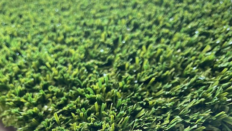 This image of AGL XL Pro Artificial Sports Turf captures the unique green features and an almost wet appearance.