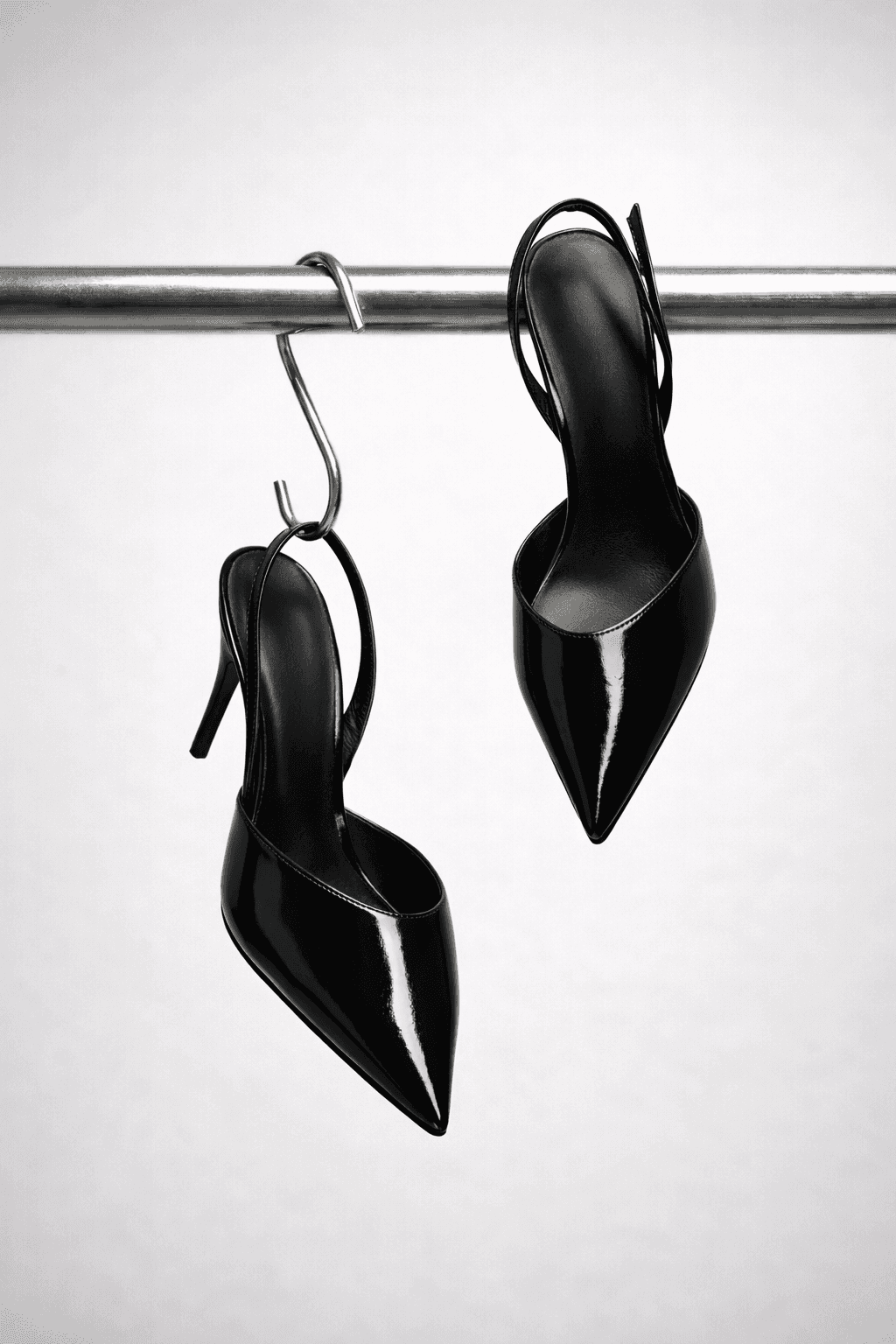 Black and white photo of man posing on camera