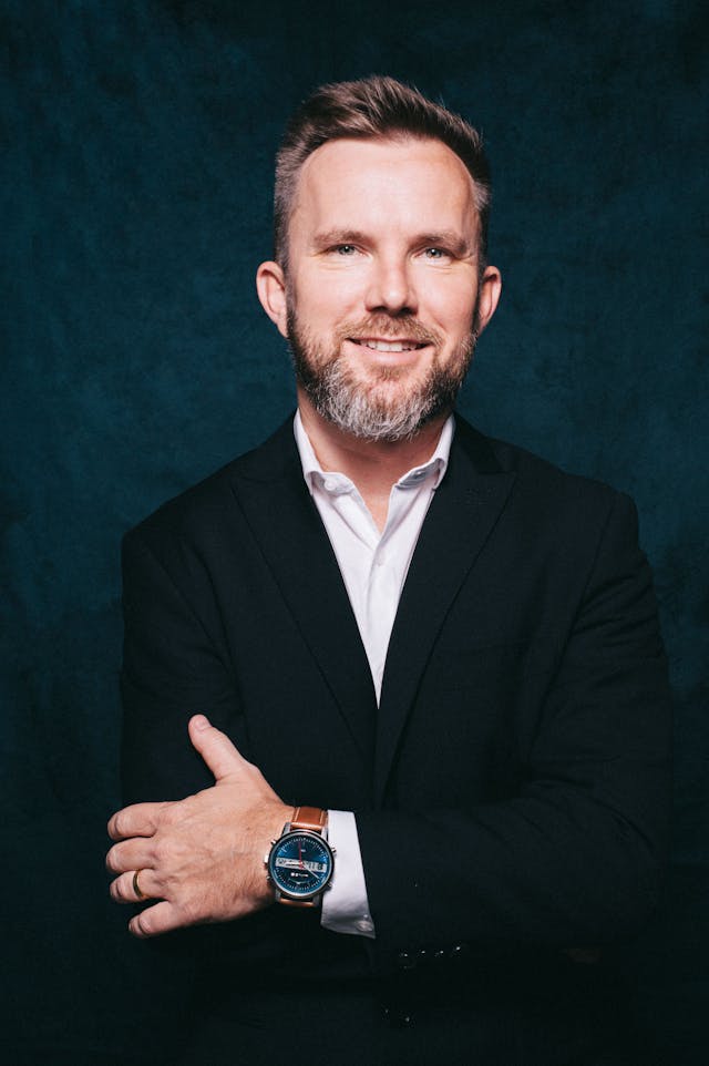 Professional Portrait of Smiling Middle-Aged Man