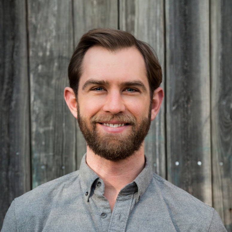 Headshot of Tyler Hartrich, Design Leader & Educator