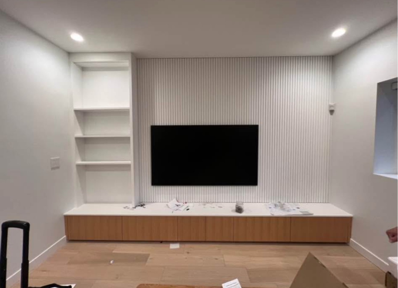 75-inch TV mounted using a ceiling mount setup in a residential home in Las Vegas, with clean wiring and a modern look.