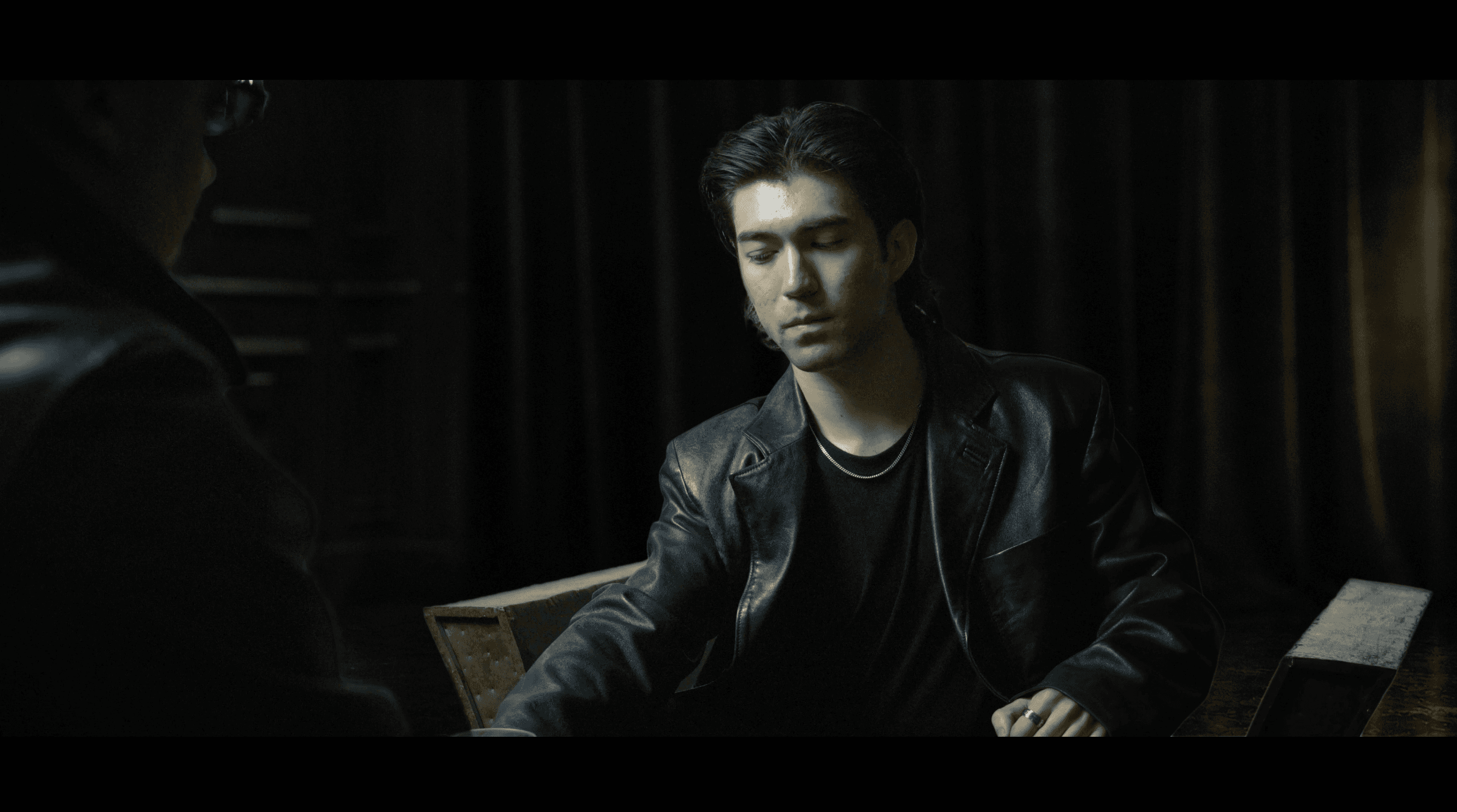 Editorial portrait in shadow