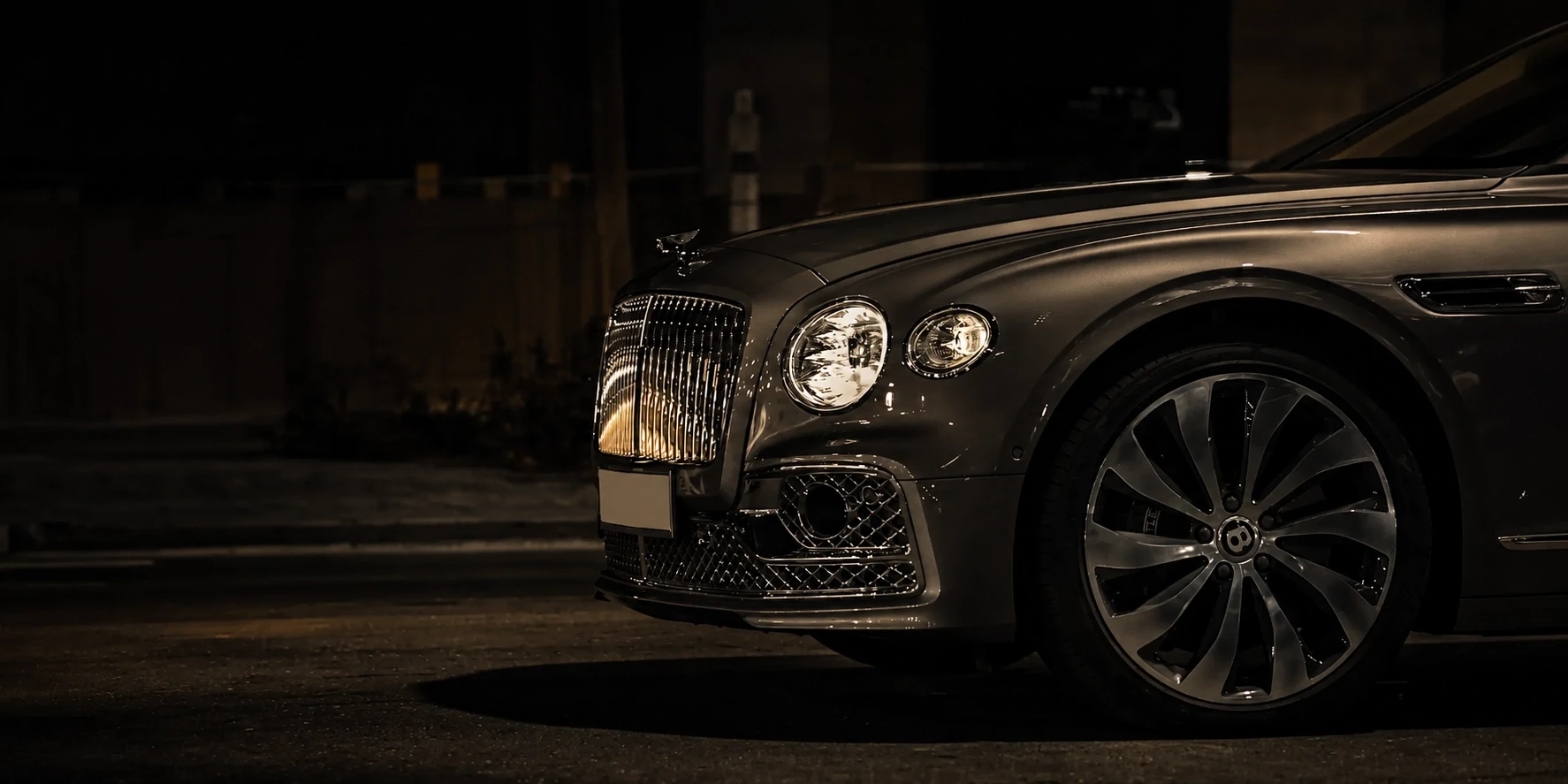 Luxury car front view at night