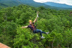 girl ziplining in the smokies