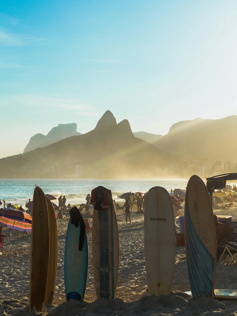 Rio de Janeiro beach, with multiple surfboards on the picture