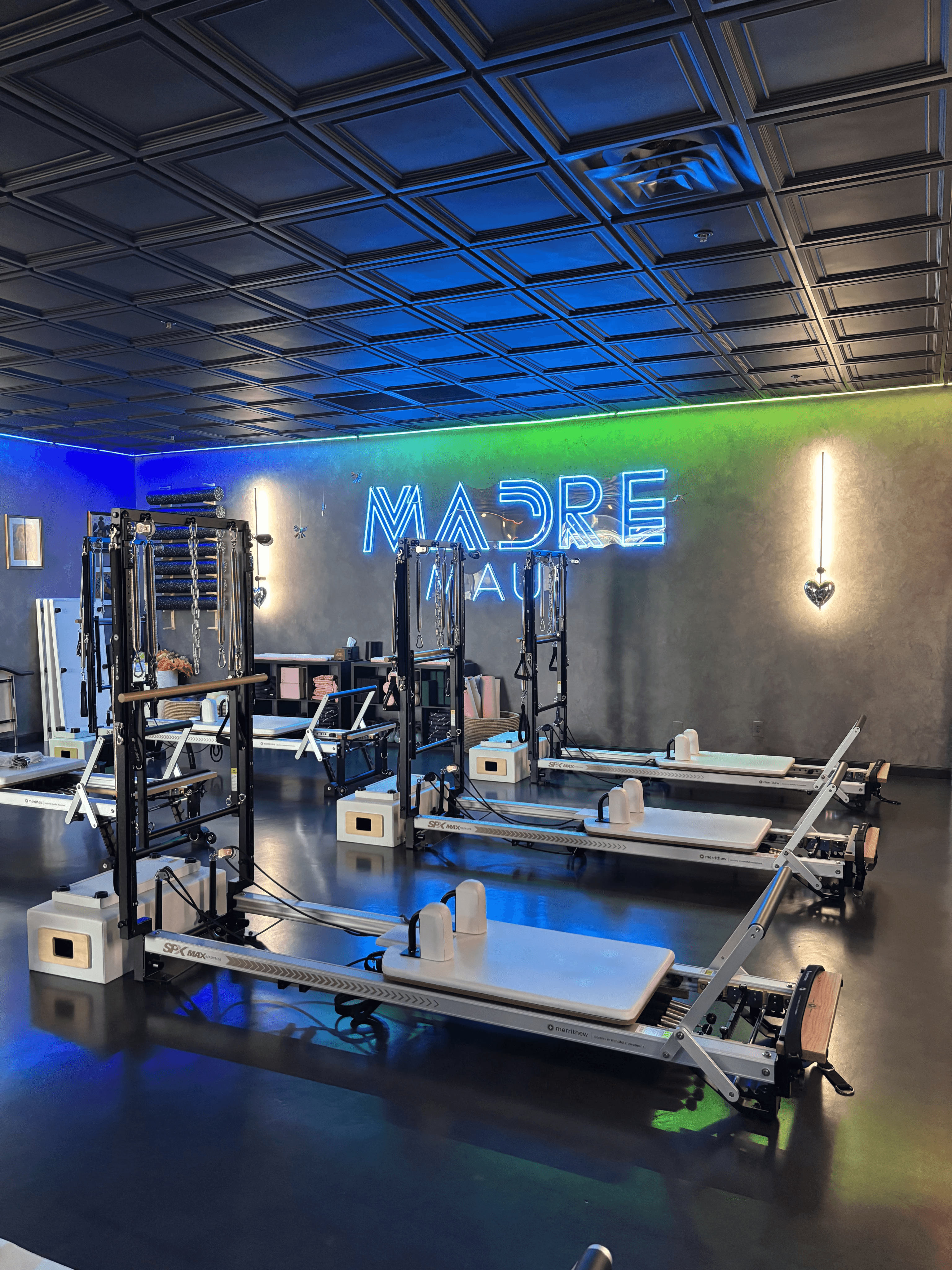 a woman is doing a piyoma exercise in a gym