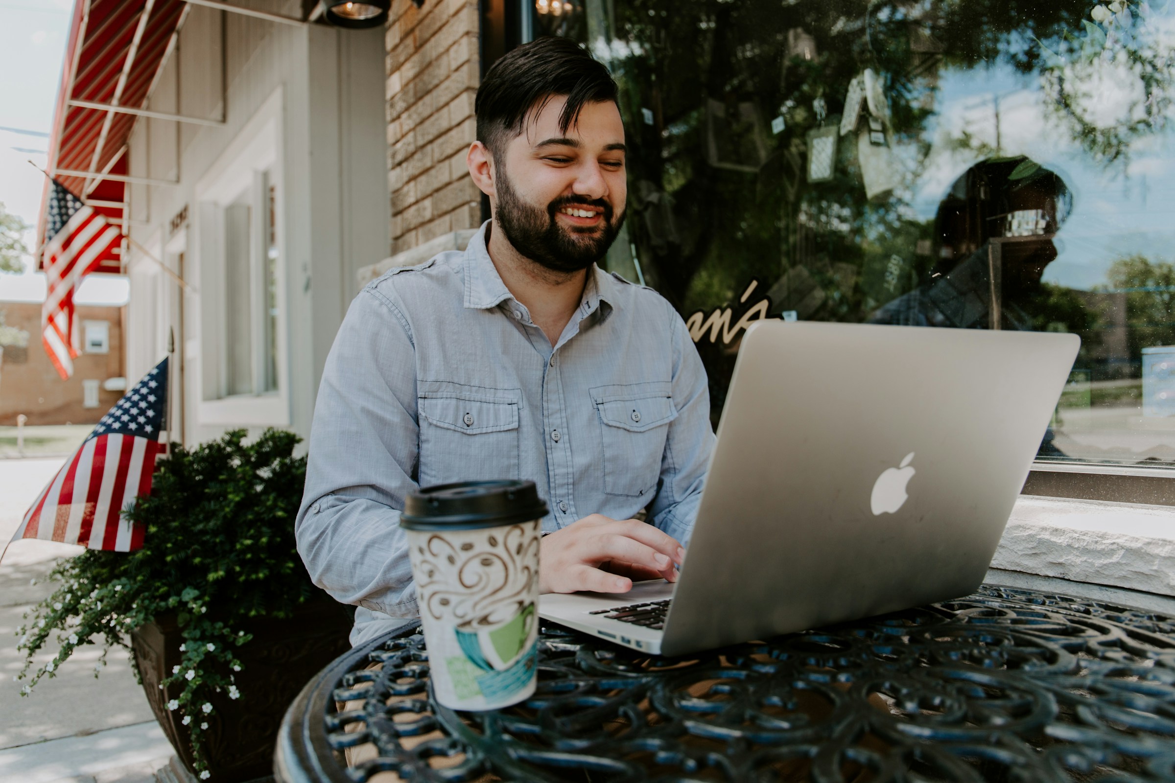 person working from cafe - How To Take A Clip From A YouTube Video