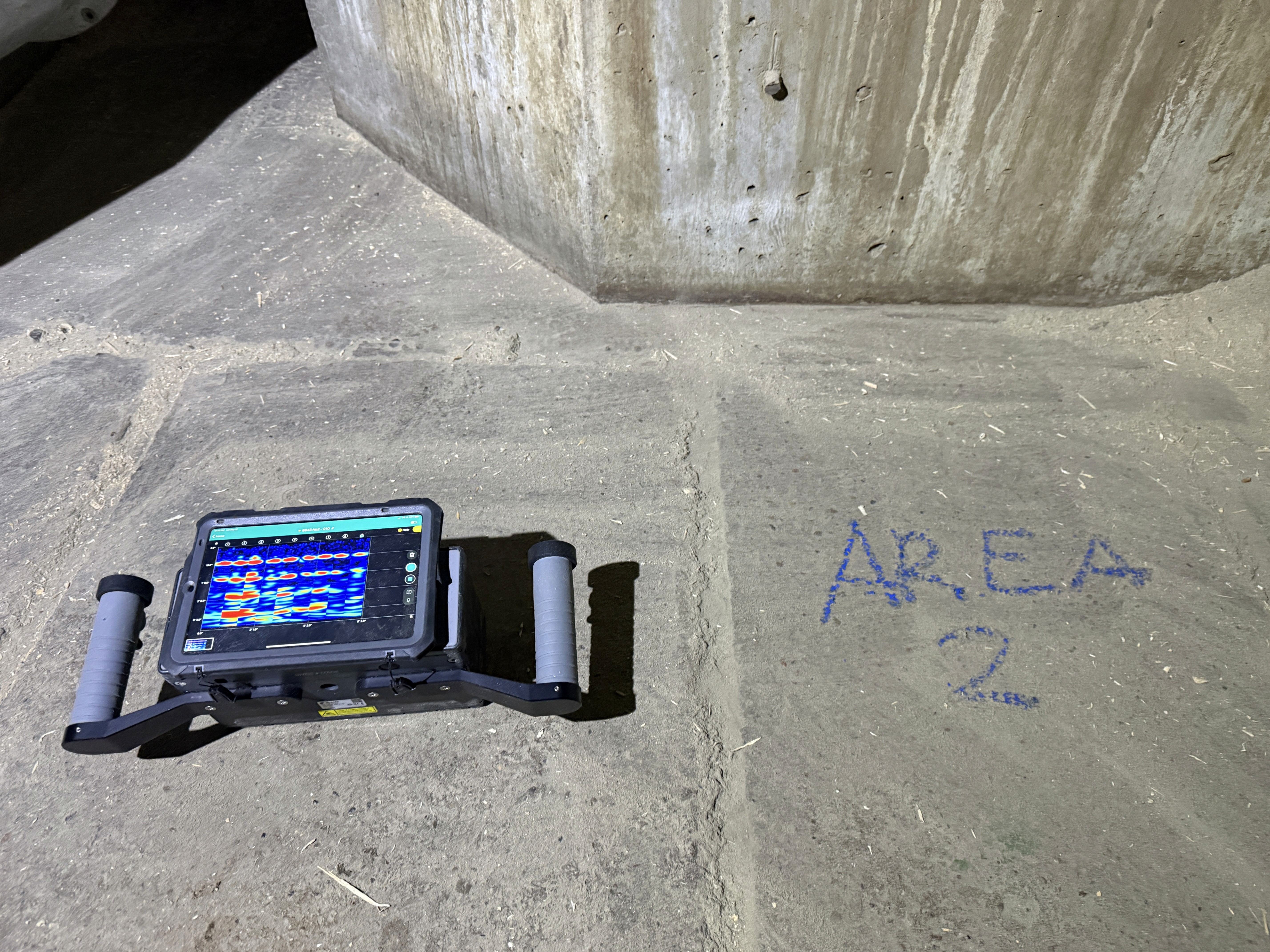 Group of people looking at a laptop