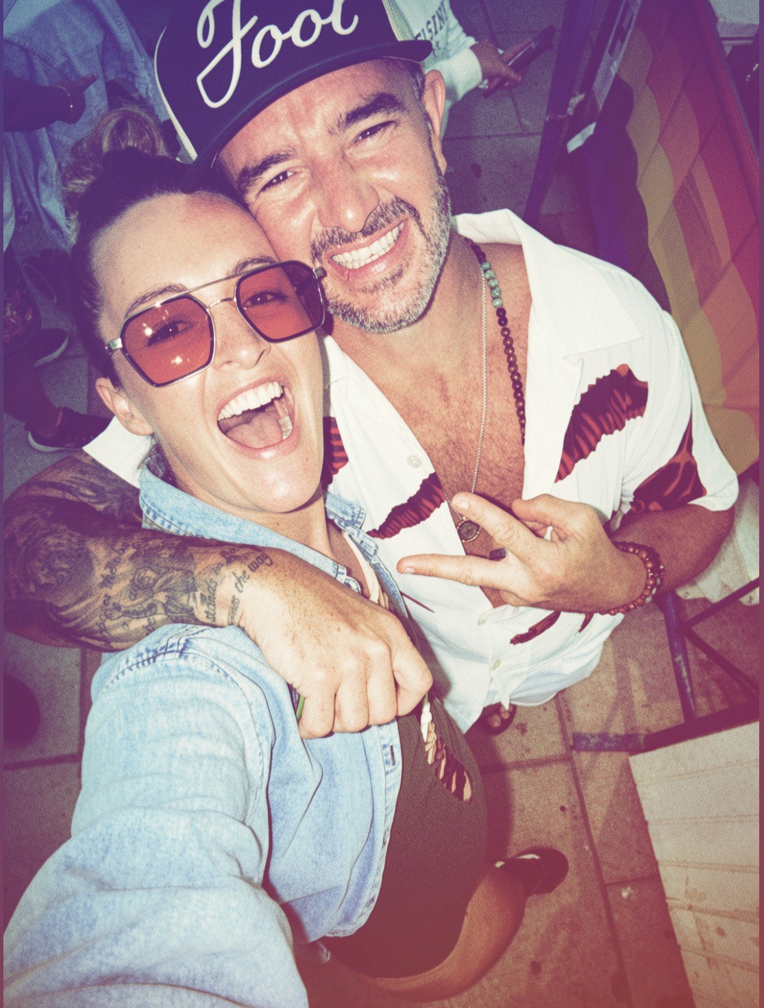 Cassandra and Luke Winegard smiling together in a candid portrait.