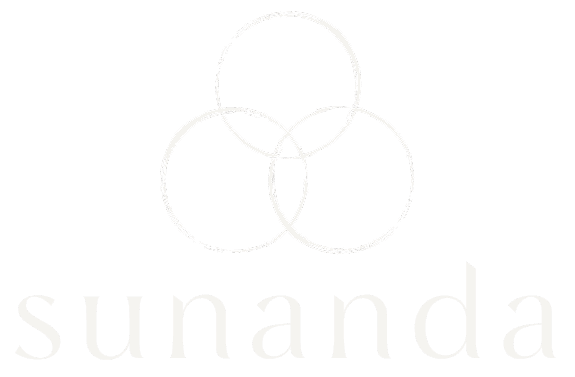 Logo of Sunanda featuring three intertwined circles above the name "Sunanda" in a modern font.