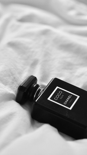 a black watch on a white surface