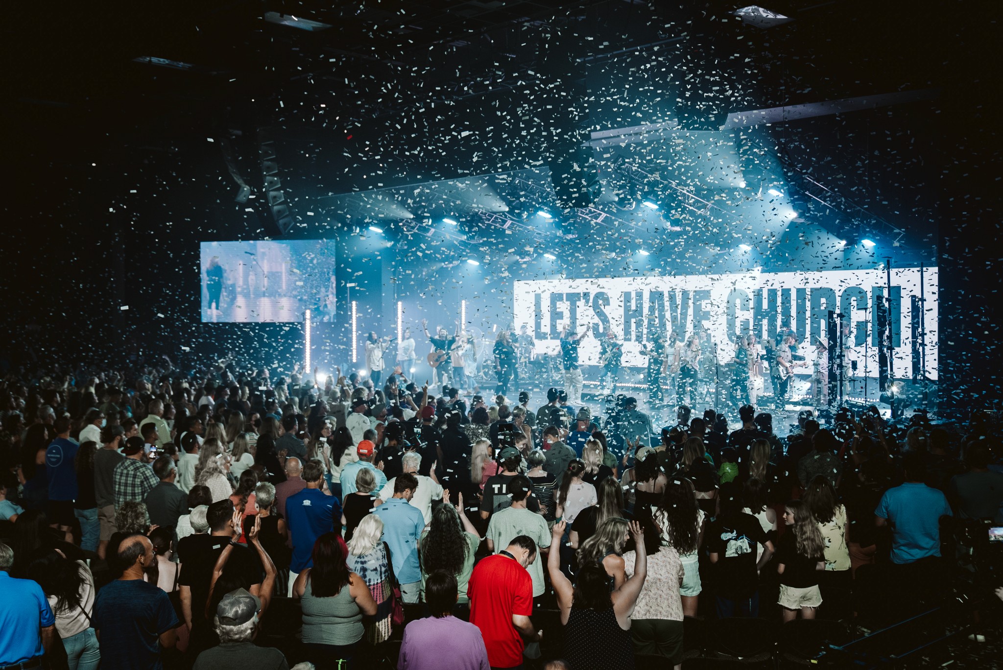 person writing on a piece of paper 