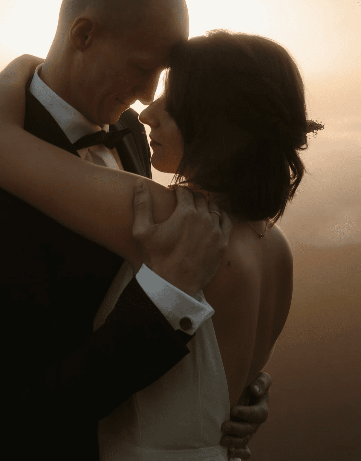 Europe elopement couple at sunrise above the clouds
