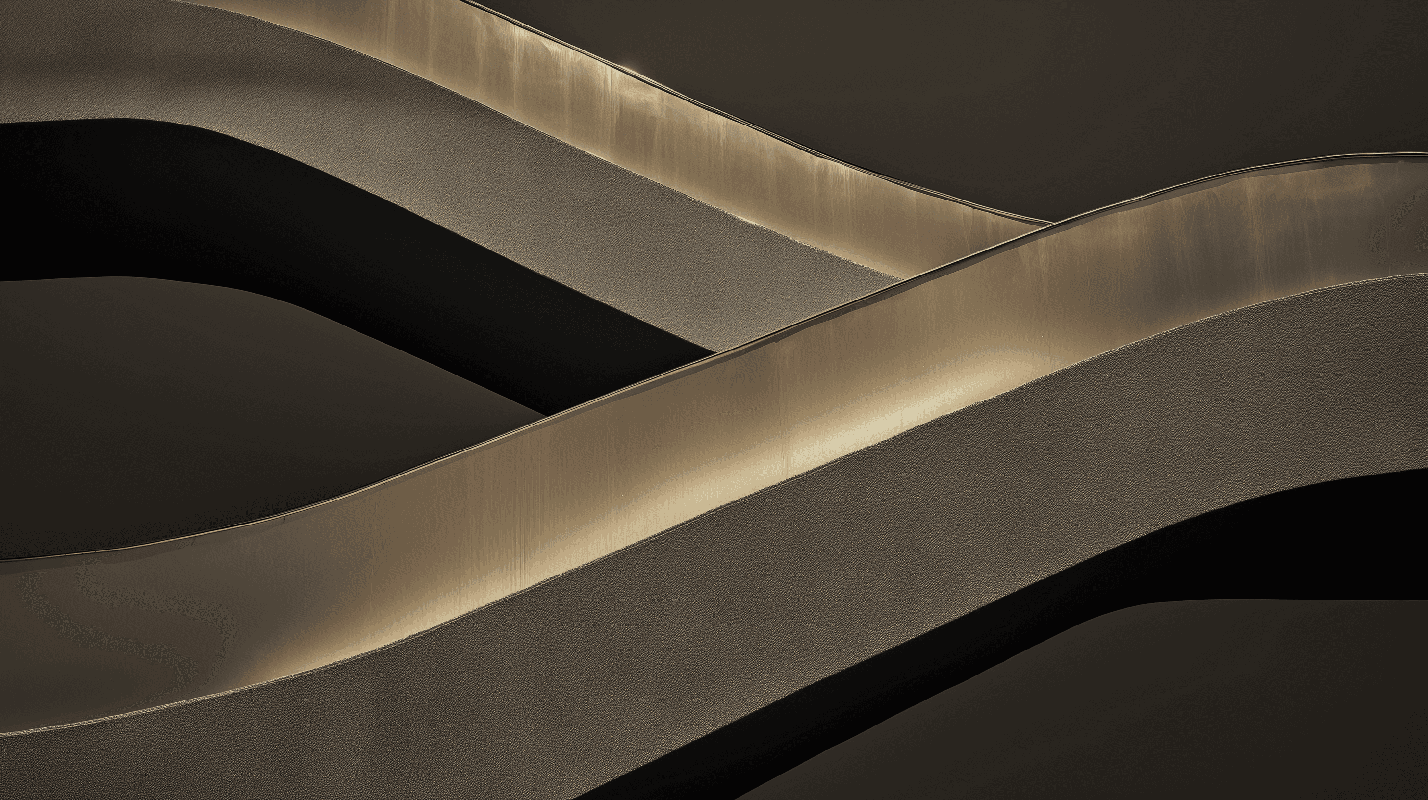 Brown suede tufted sofa cushion with button detailing in warm interior lighting.