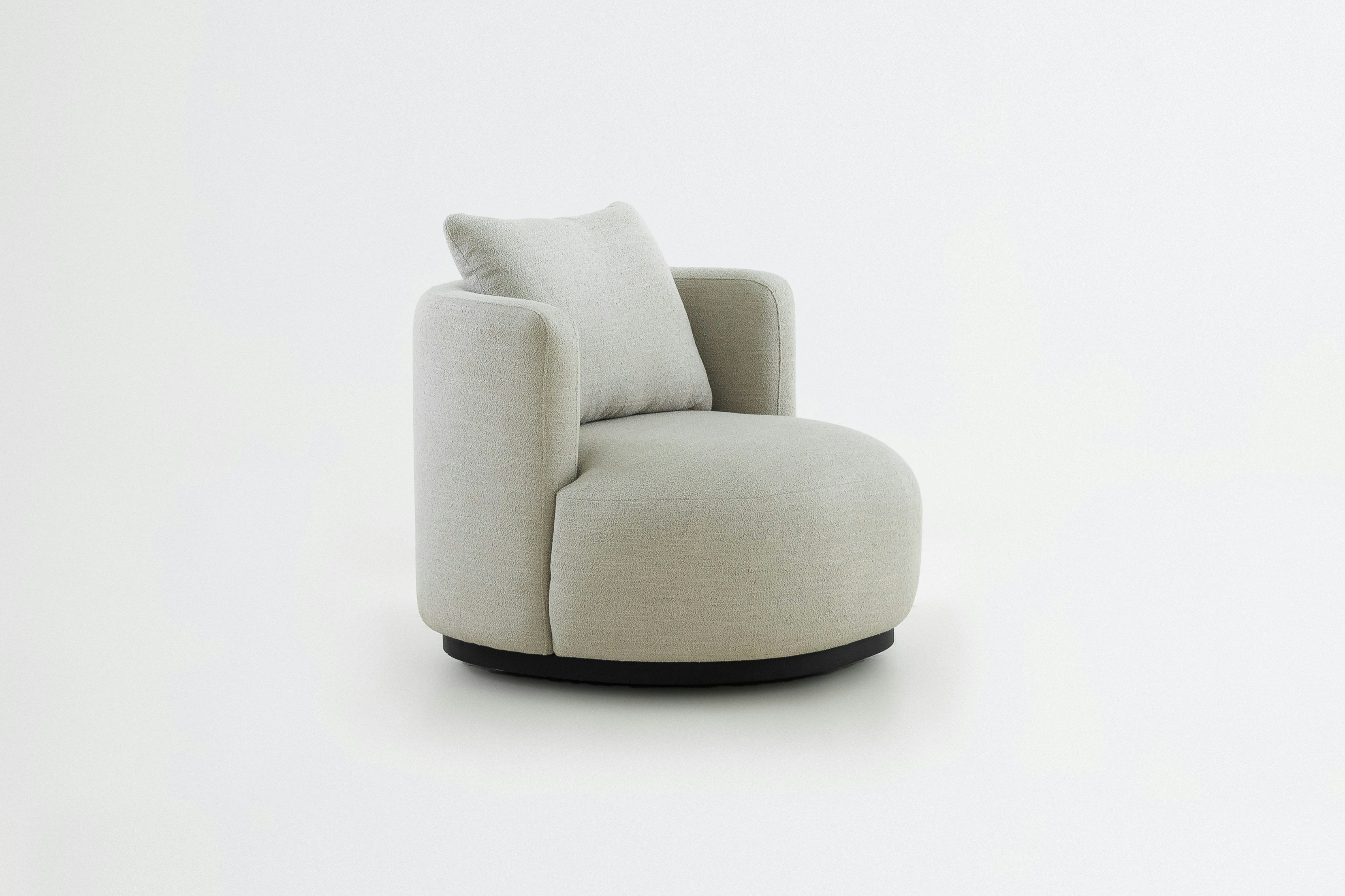 A modern, cozy chair stands on white background.