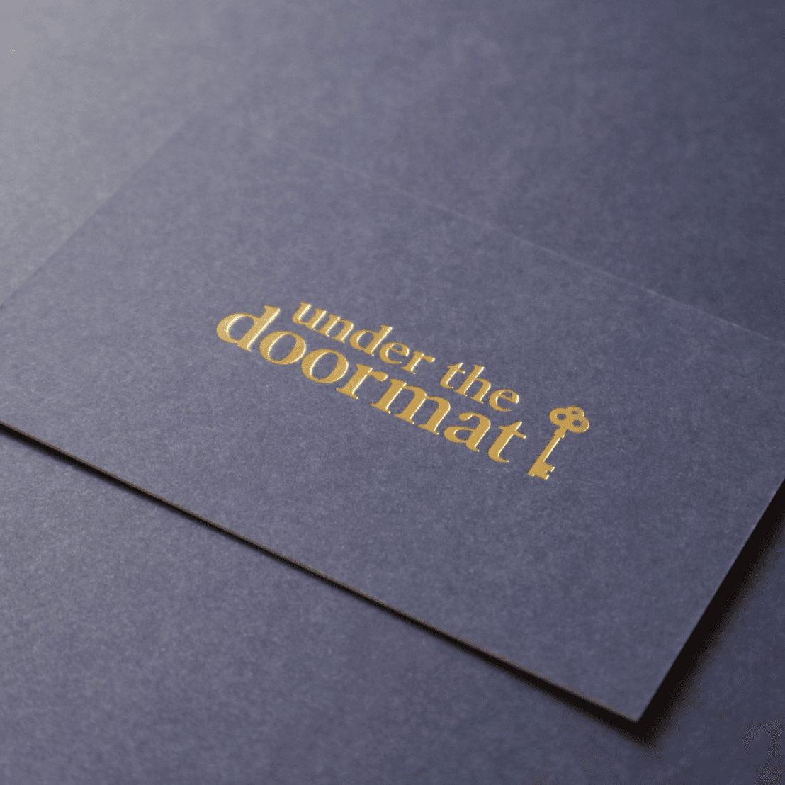 Under The Doormat Business Cards