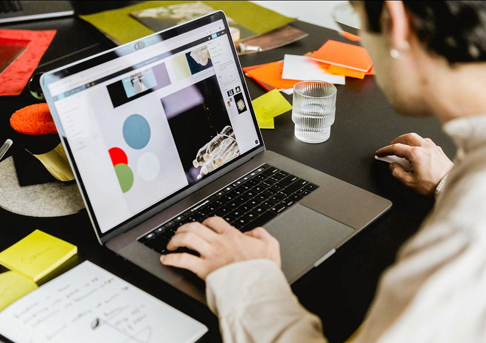 Guy on laptop working