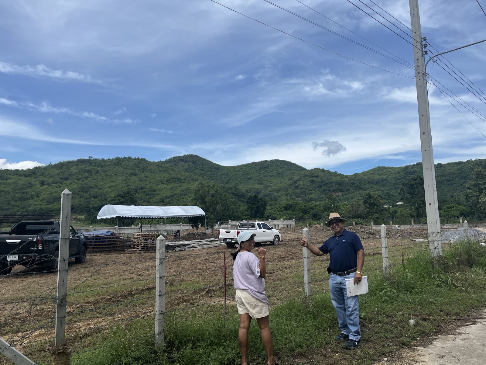 Owner and Builder at site before construction