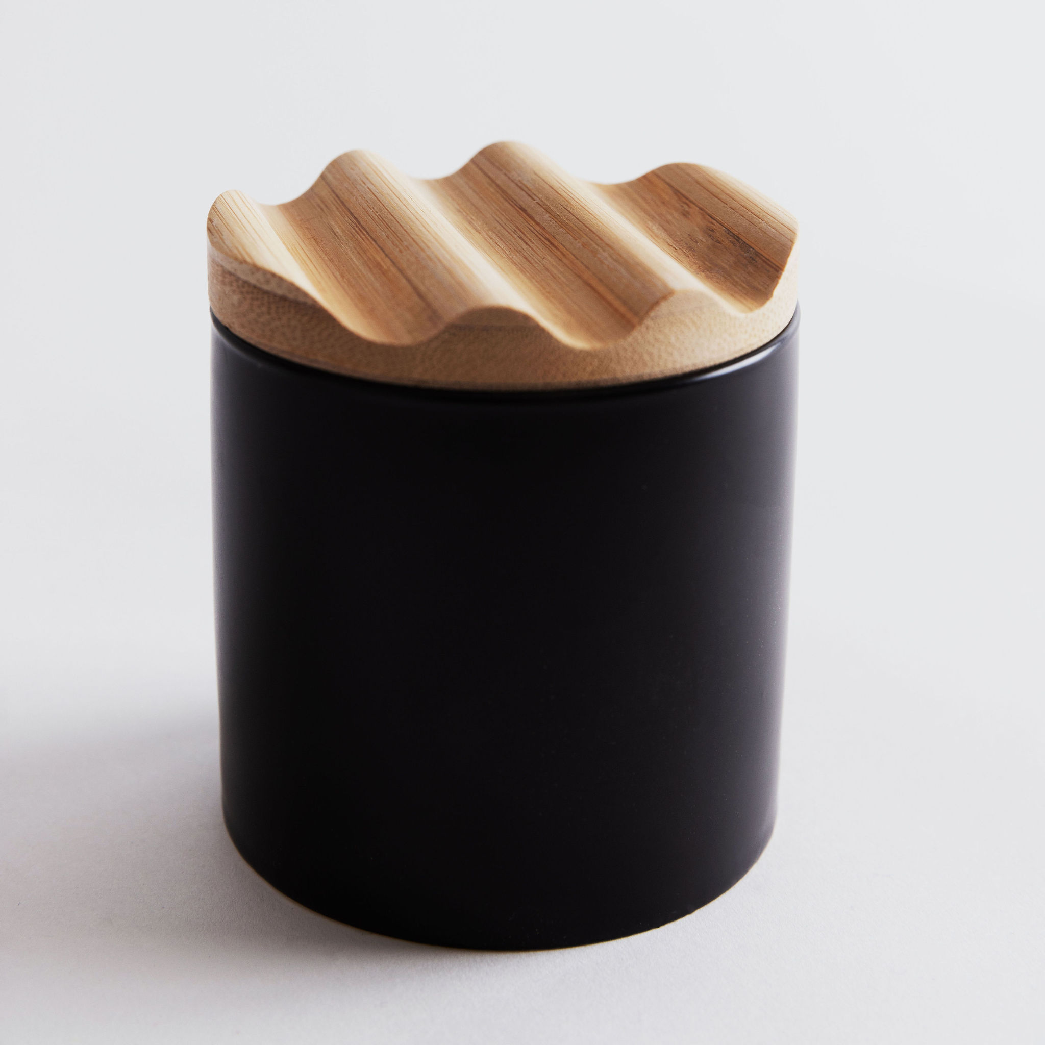 Woman with red hair covering mouth with hair