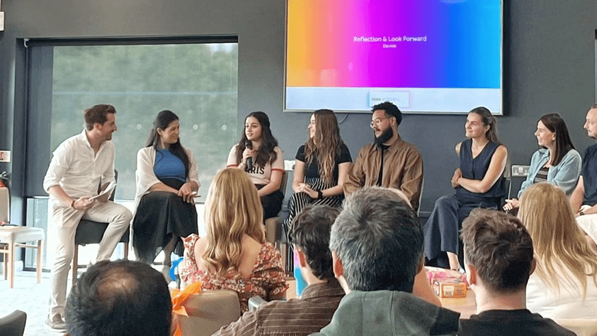 Artistic fashion portrait with colorful floral and avant-garde wallpaper