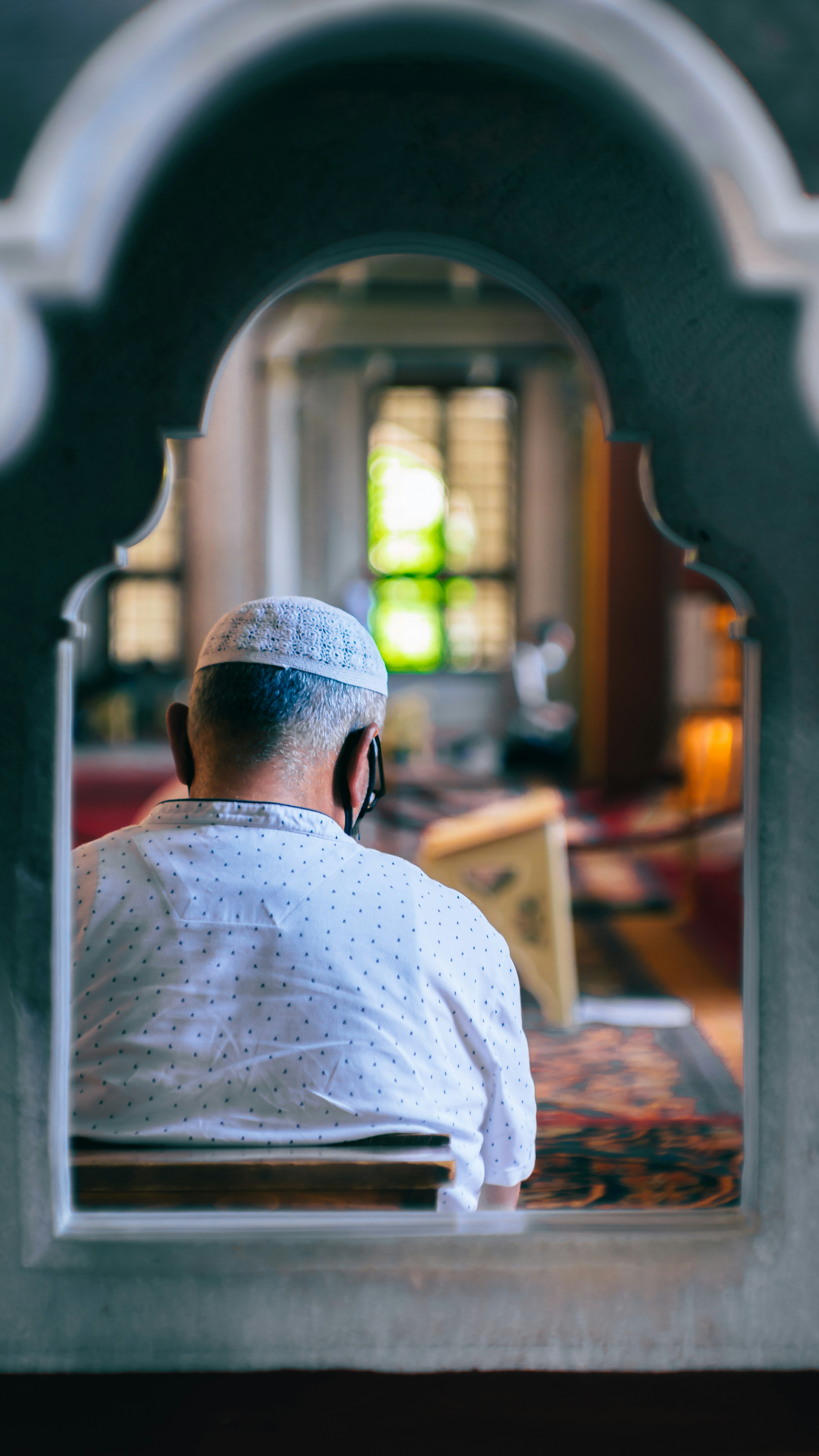 person making a contactless payment with a card