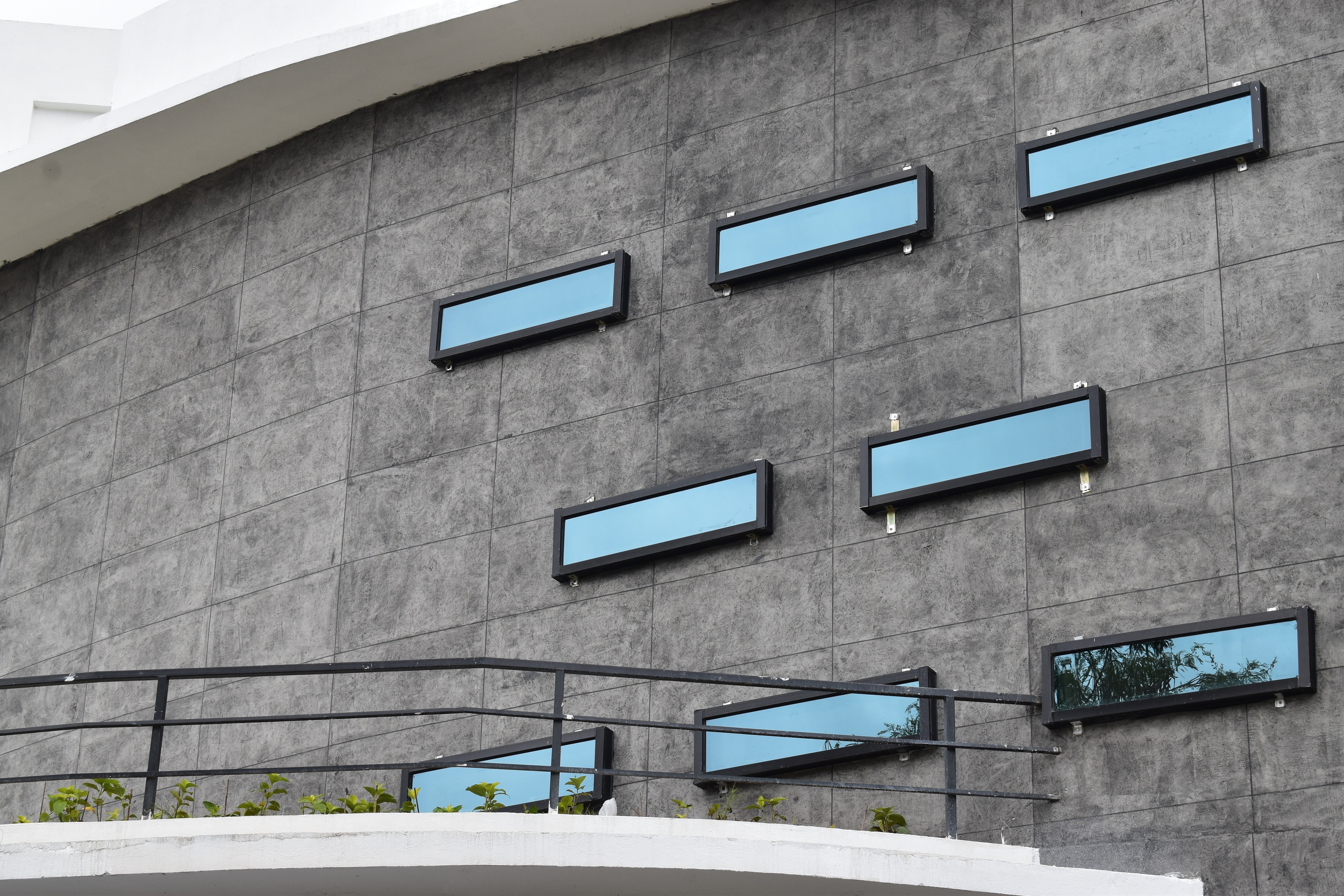 white concrete building under blue sky during daytime