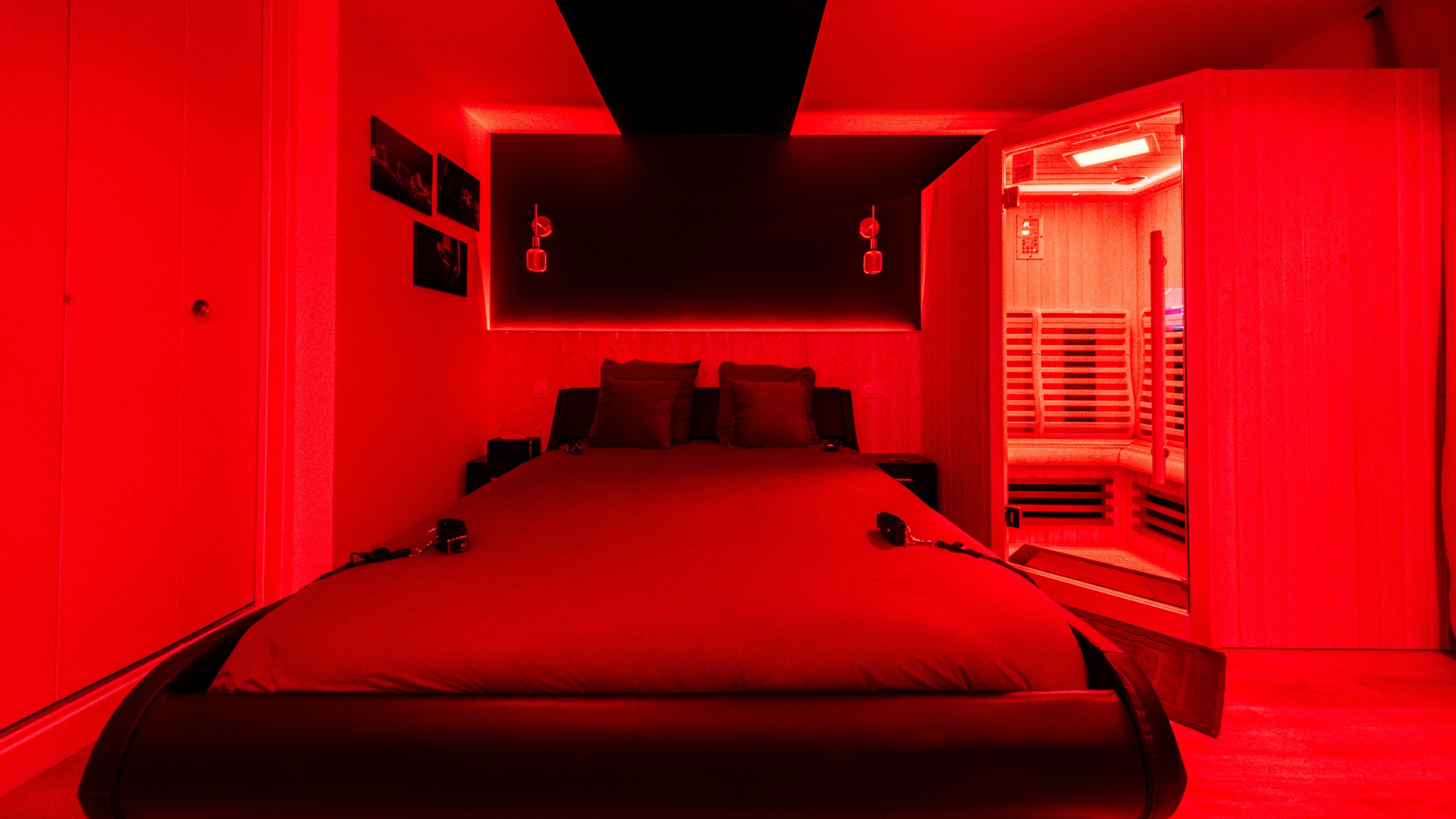 Sunlight streams through a narrow sandstone canyon.