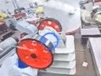 A machine with a red and white wheel
AI-generated content may be incorrect.