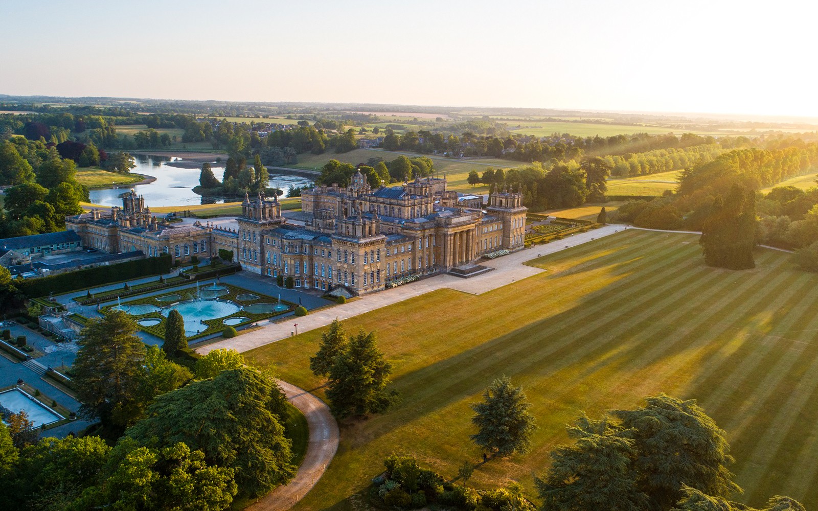 Blenheim Palace aerial view with gardens and surrounding landscape.