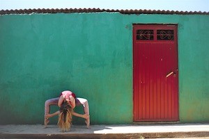 black laptop computer on brown wooden table