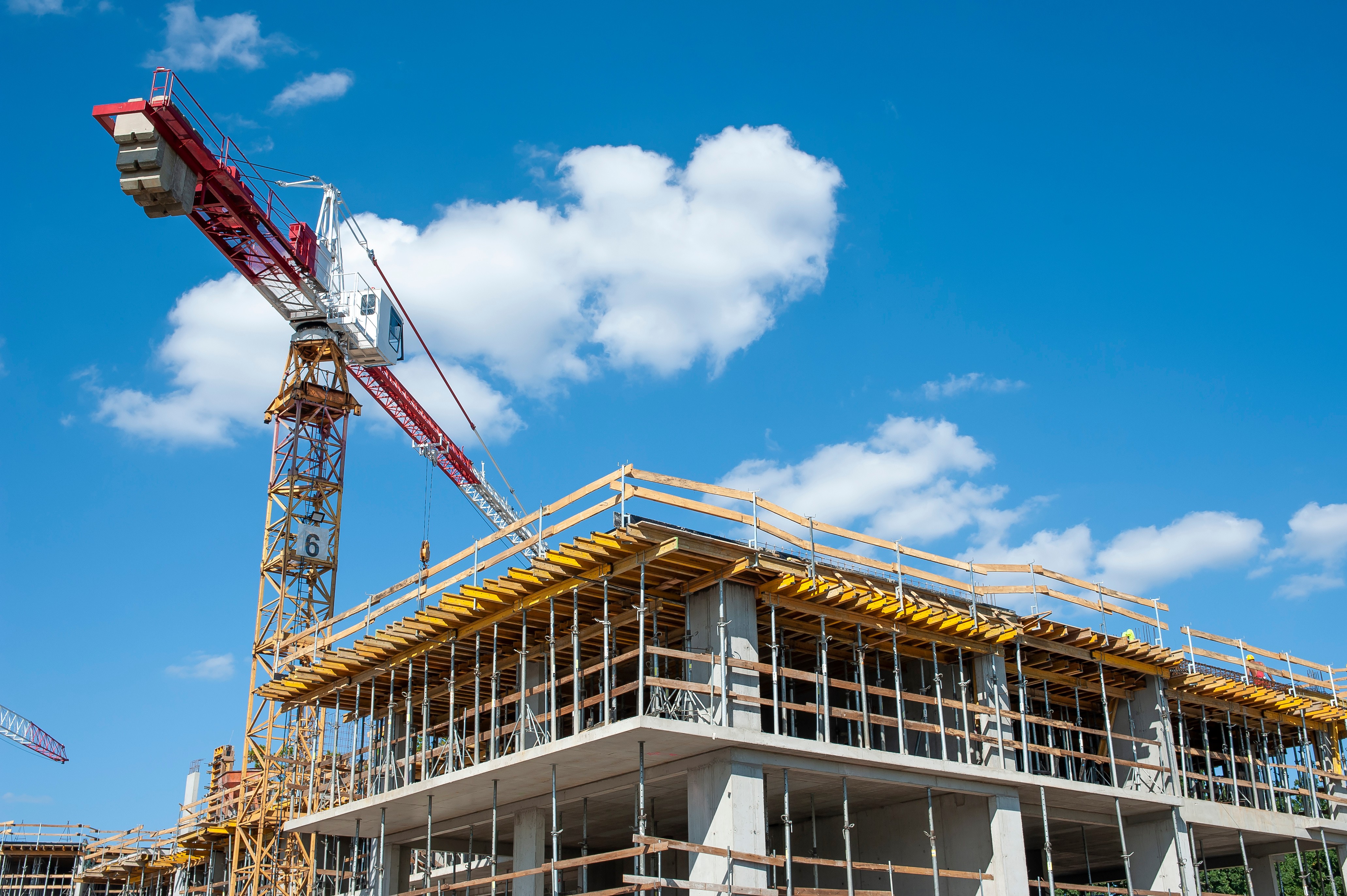 Apartment building under construction on a sunny day