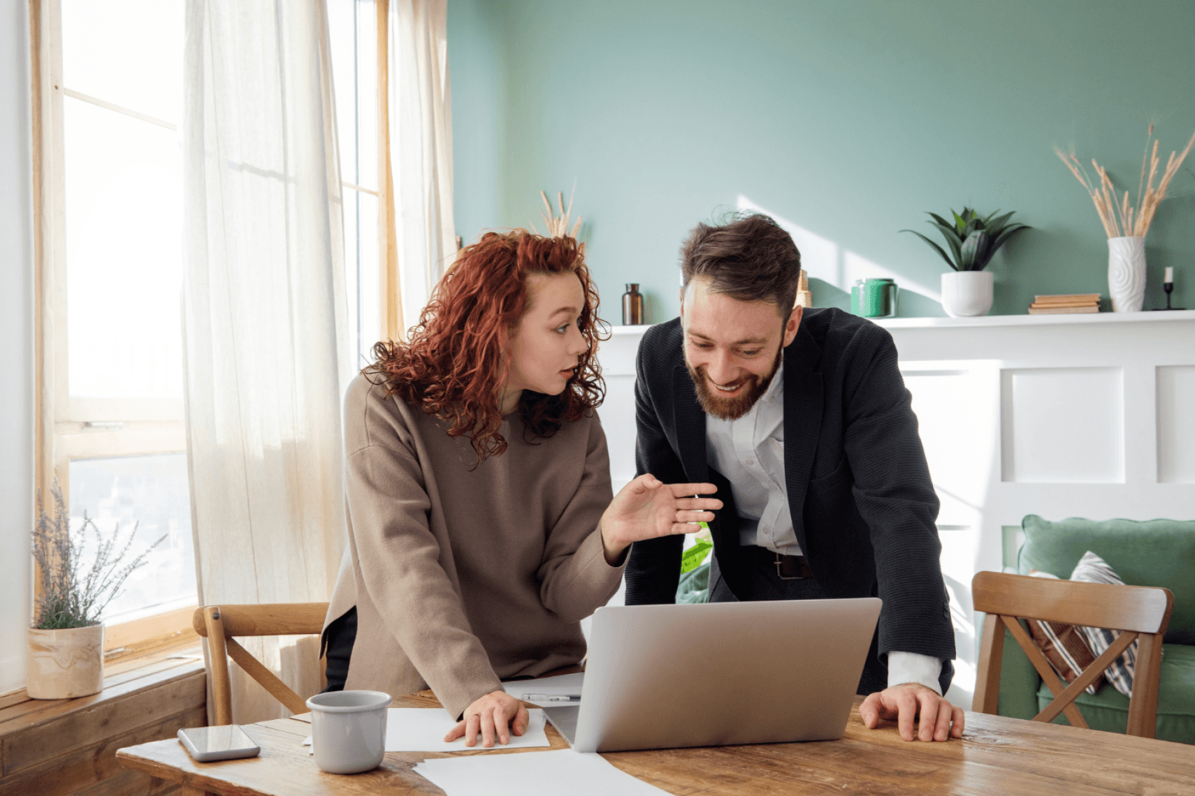 business people discussing on laptop