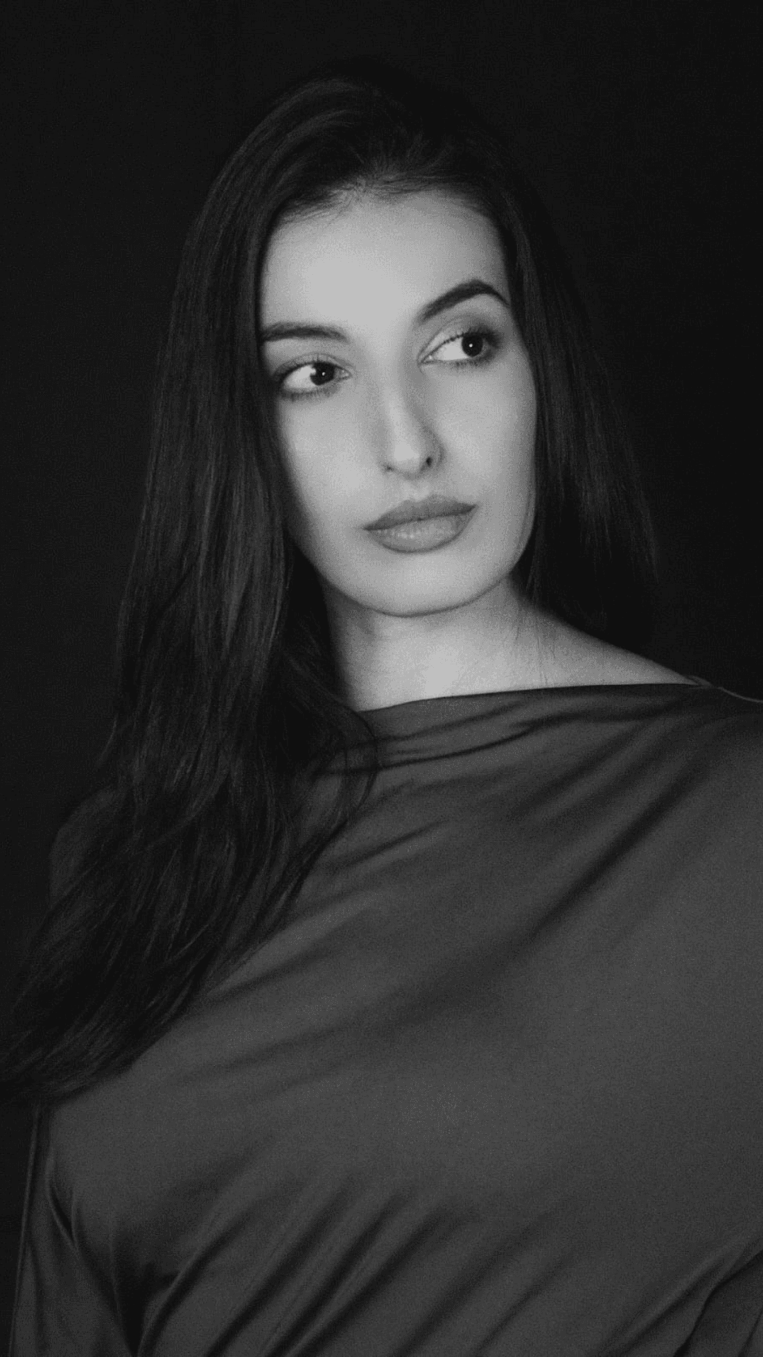 Woman standing on his one leg, doing the yoga pose