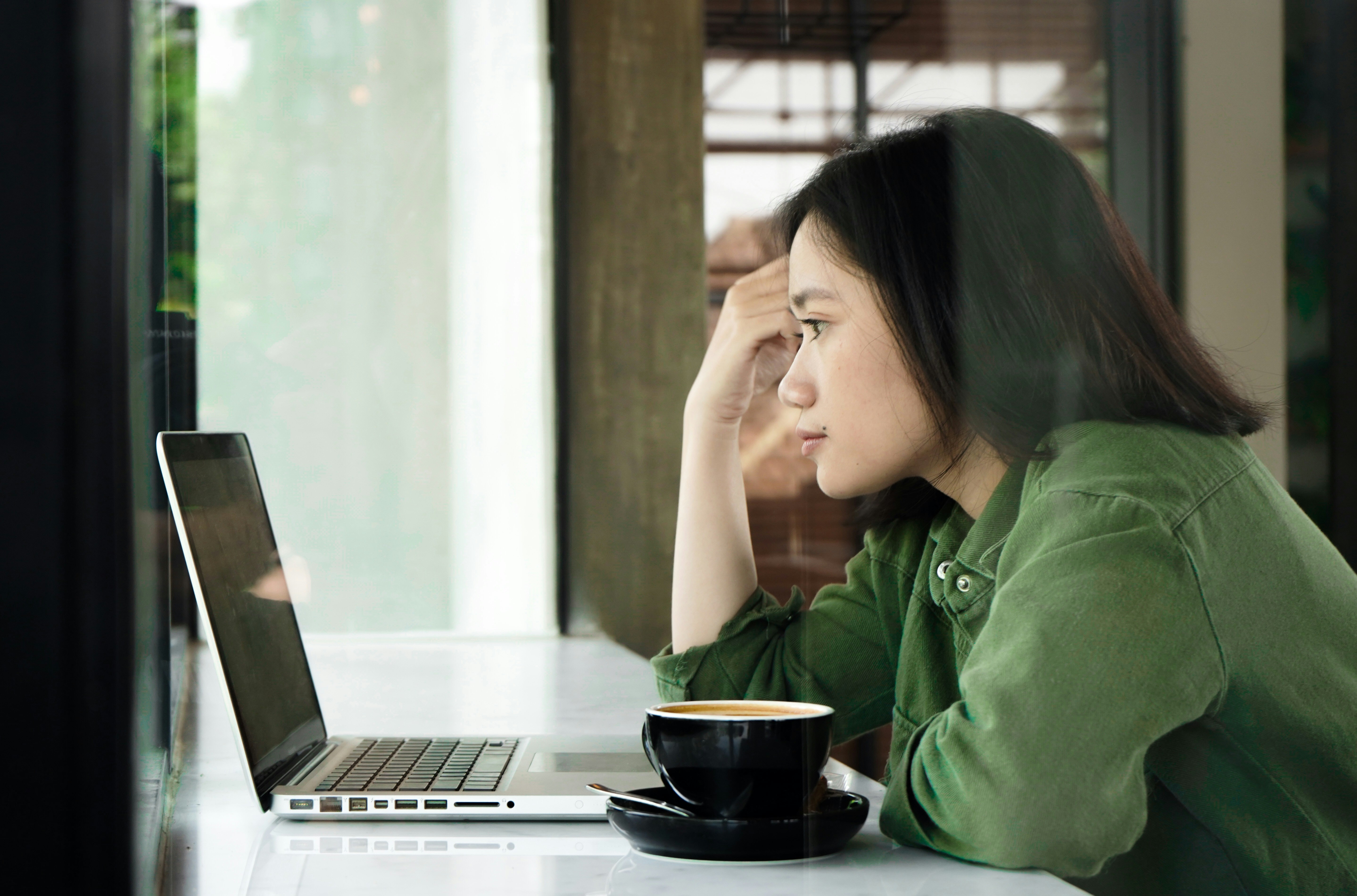 Woman taking an assessment on her laptop