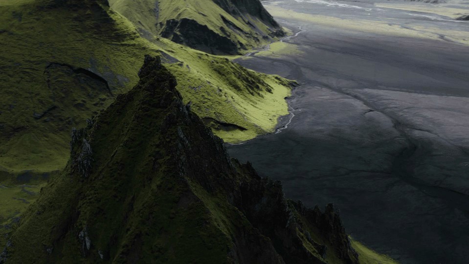 Person standing at a steamy food stall at night.
