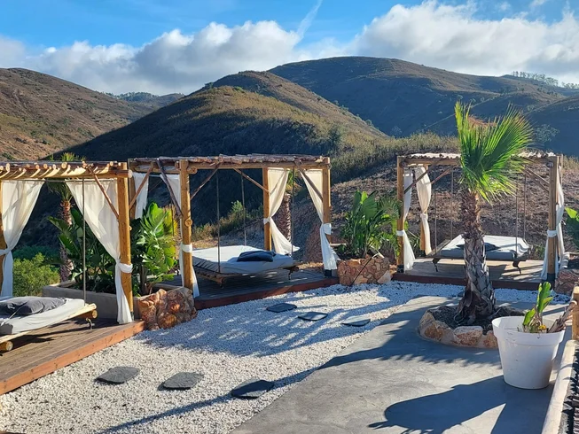 Structured wellness retreat with Bikram yoga, coaching and a polished resort-style setting.