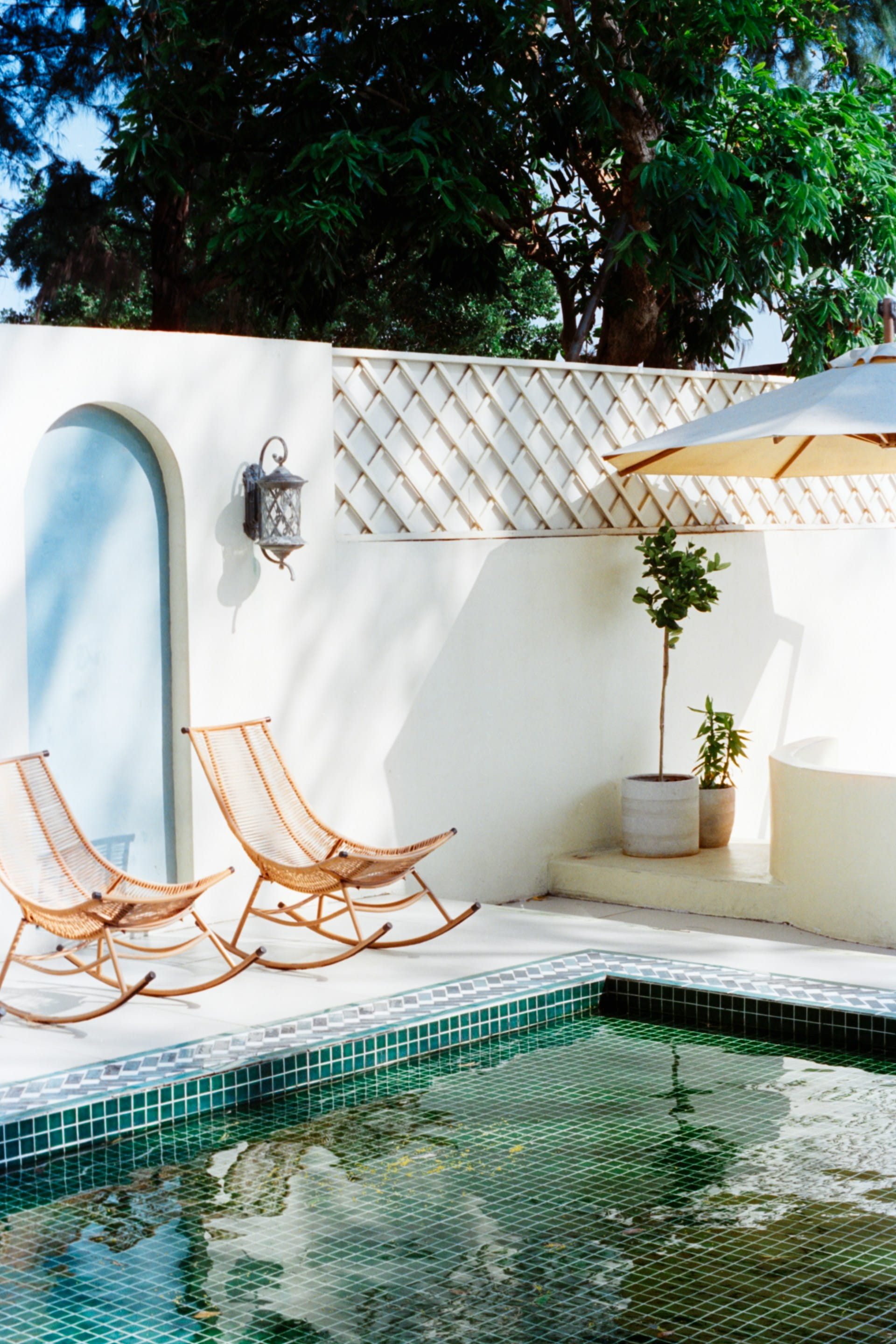  Lush pool with green archways