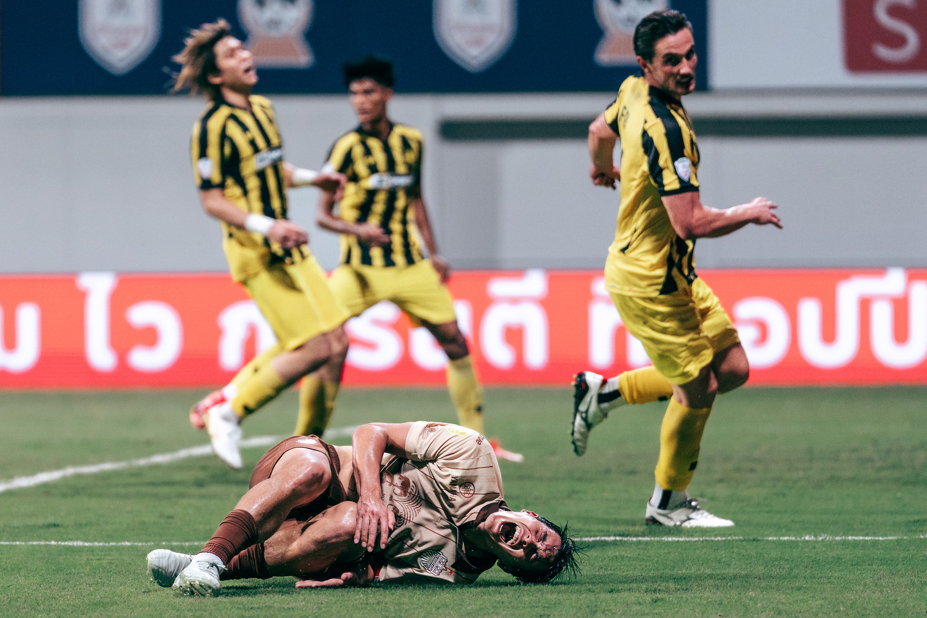 Kenny Dougall reacts after a tackle during a match between Lion City Sailors and PKR Svay Rieng in the ASEAN Shopee Cup 2025/26 at Jalan Besar Stadium, 2025