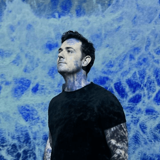 Profile picture of Ignasi (Iggy) Albero, Brand Lead at Web3 Foundation, against a blue background.