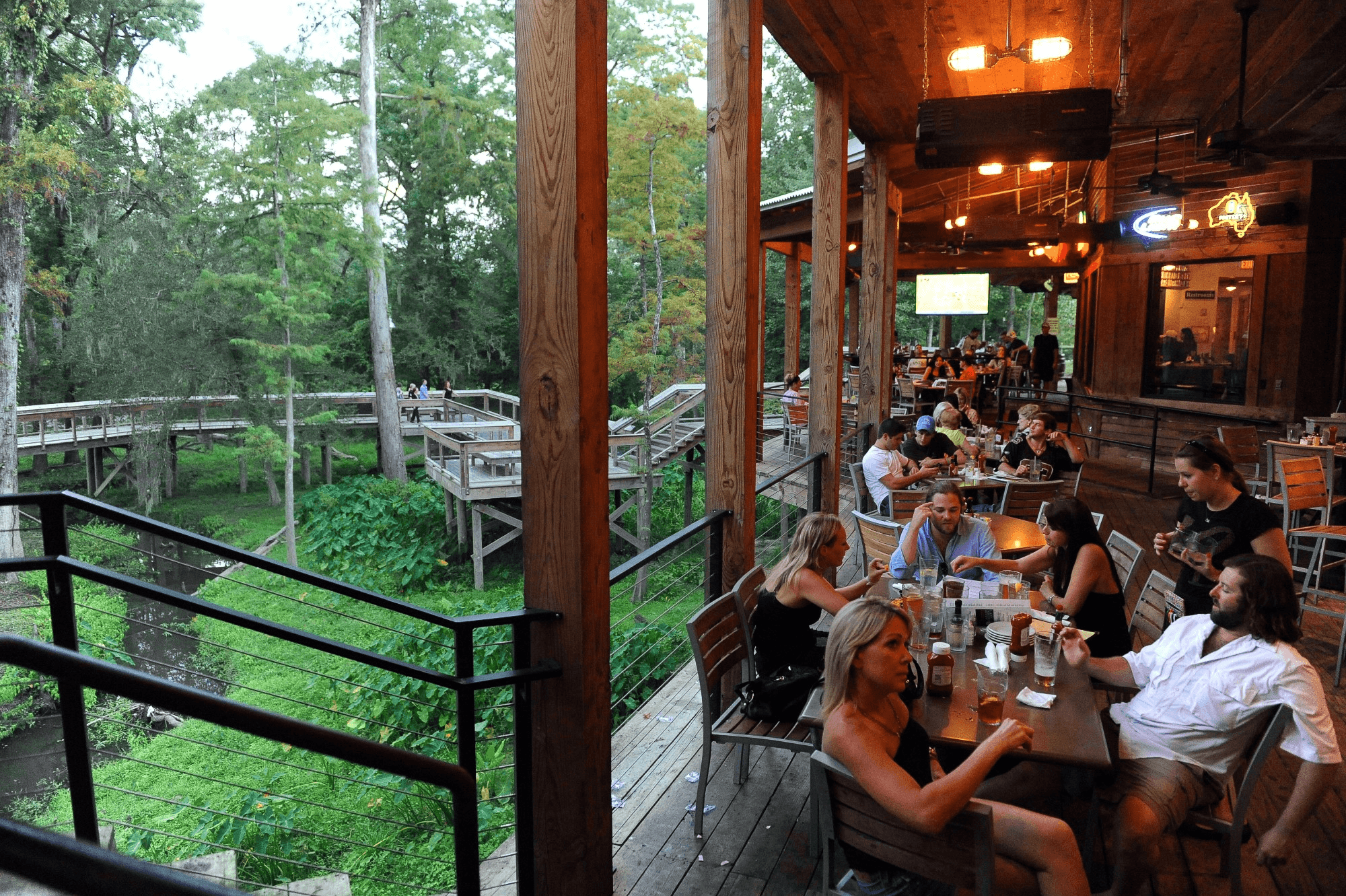 People dining outside at The Chimes Restaurant in Covington Louisiana