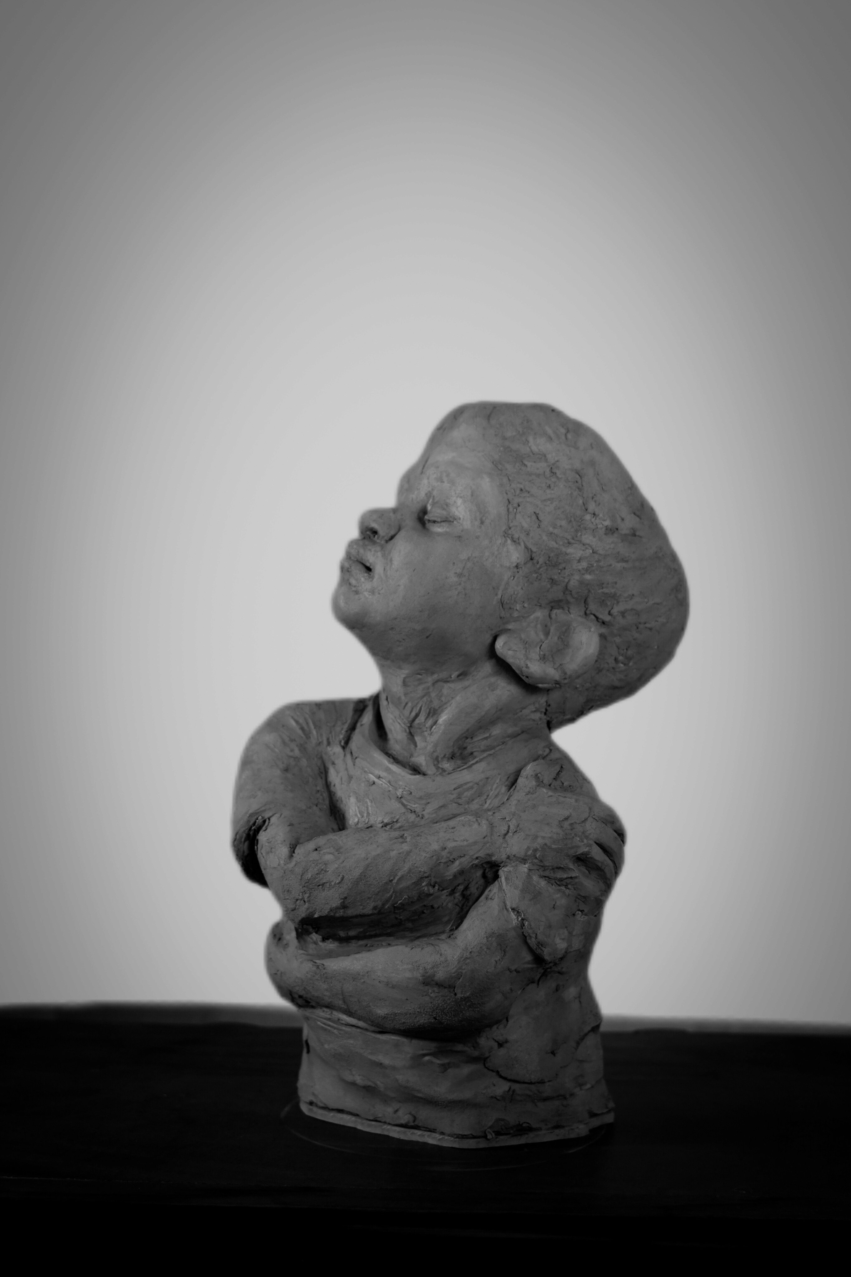 portrait sculpture of a child