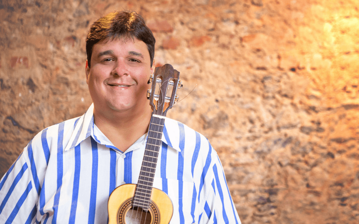 An image of a small tree growing out of a mossy area representing environment and nature