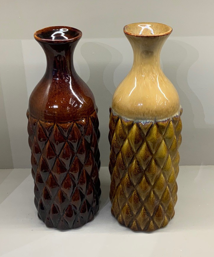 Diamond textured ceramic vases in brown and ochre glaze