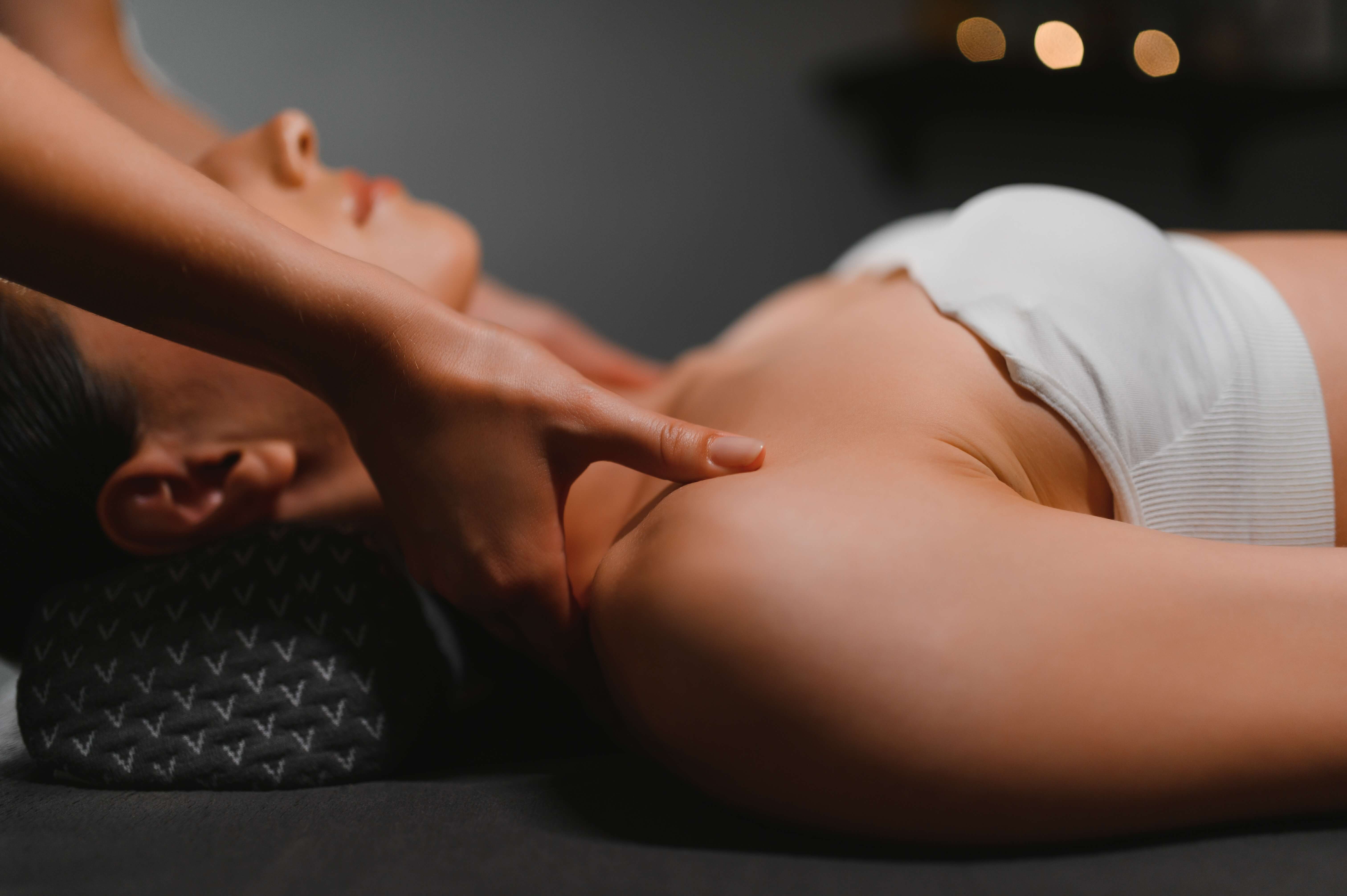 Woman receiving shoulder massage