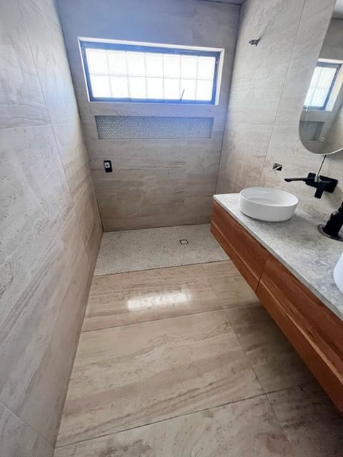 Ohana plumbing staff in front of the plumbing vehicle.