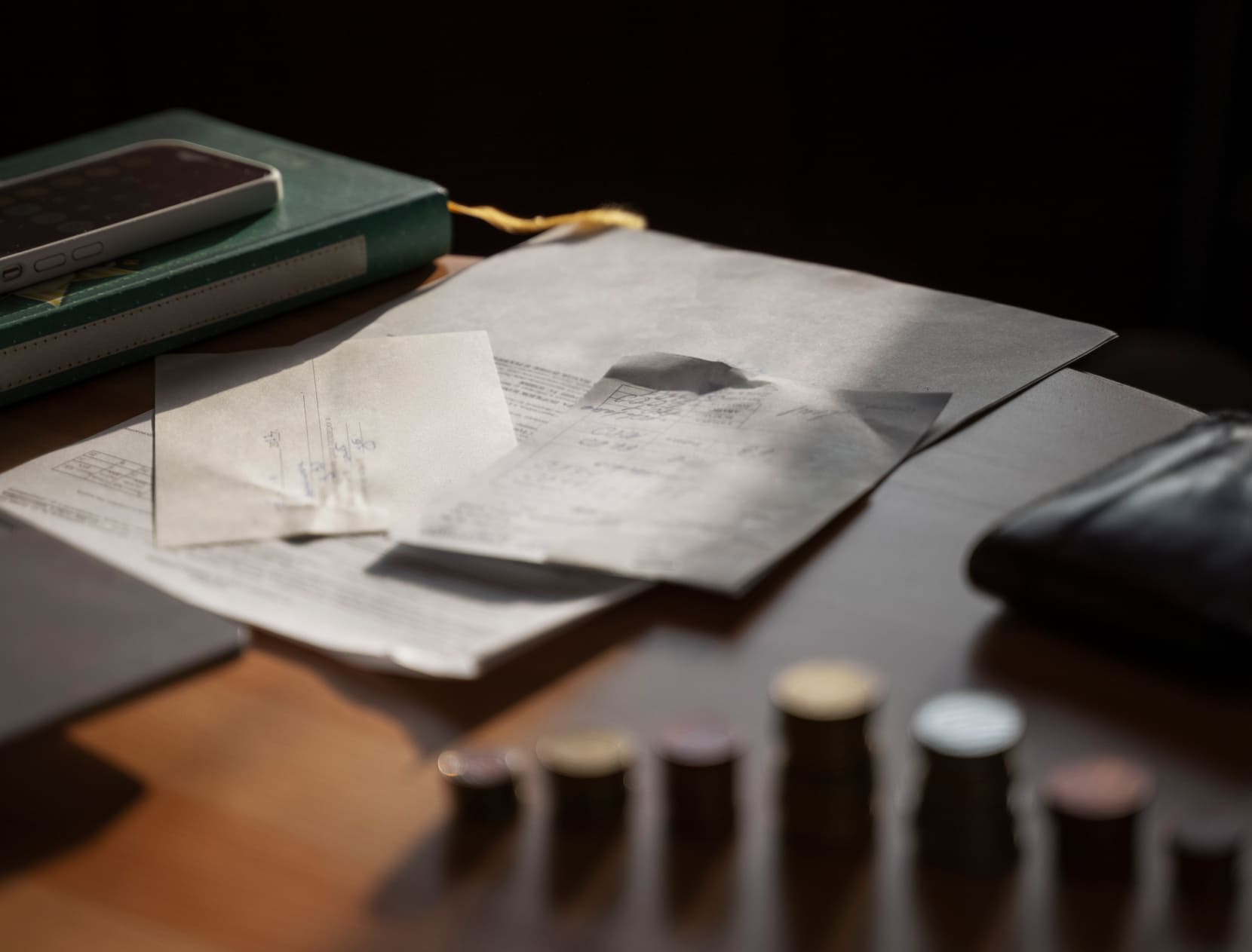 Documents and papers spread on a desk