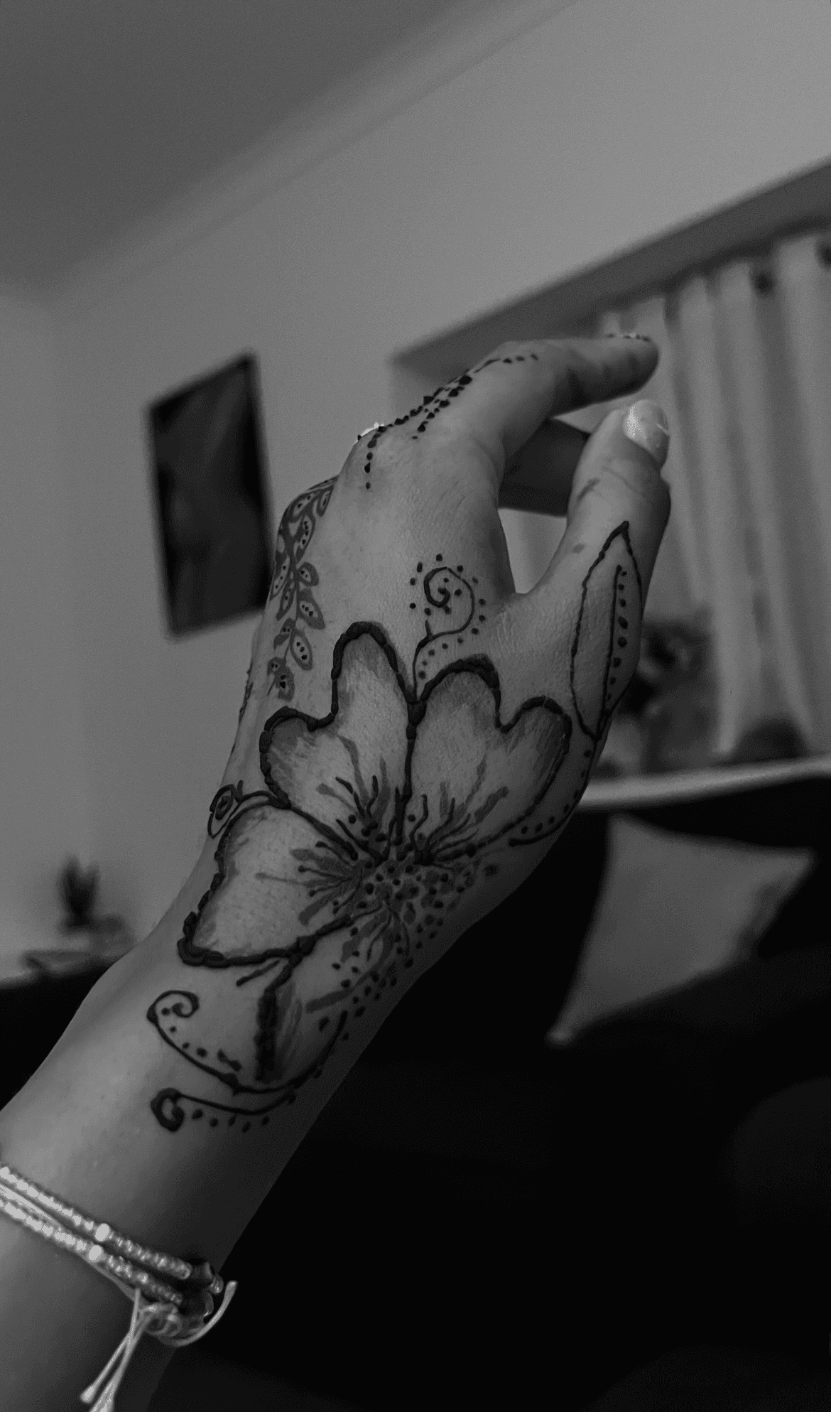 A woman getting a facial mask on her face