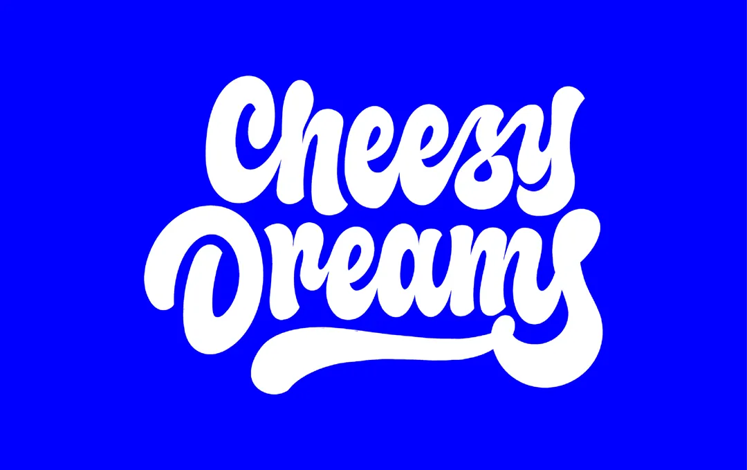 Cheesy Dreams logo design in white hand-lettered style