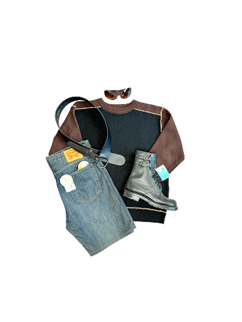 Clothing flat lay: sweater, jeans, boots, belt, sunglasses on black background.