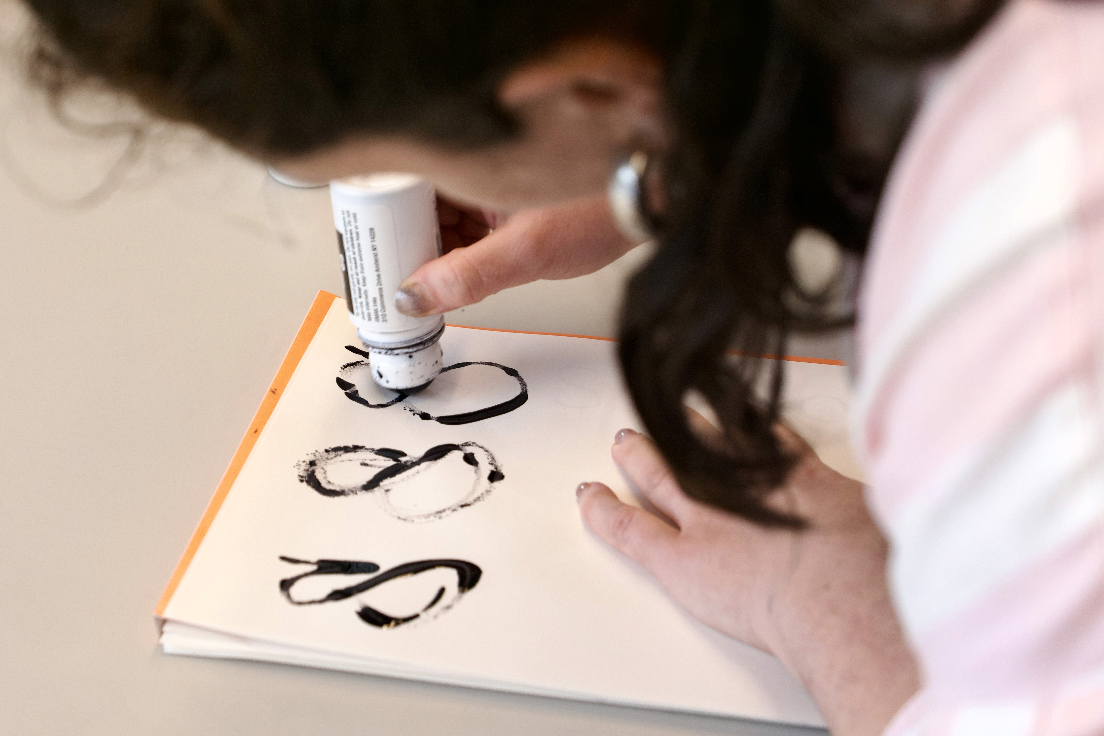 Type designer drawing letters